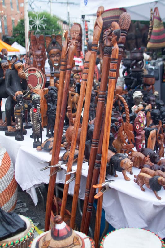 Hand-carved African wooden sculptures and walking sticks